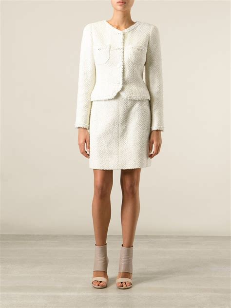 chanel tweed jacket and skirt.